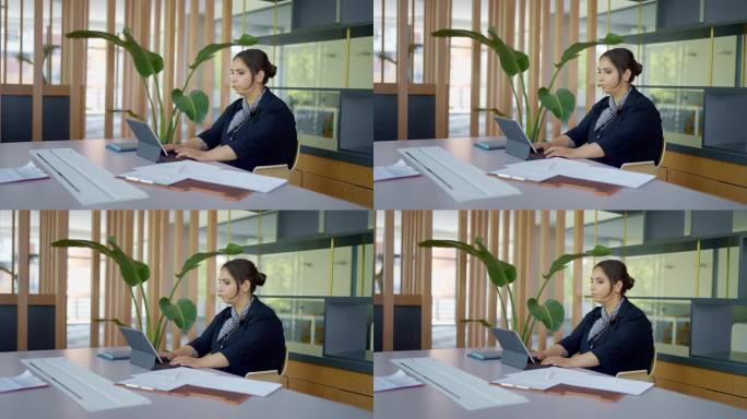 女商人在开会前回顾演示和报告
