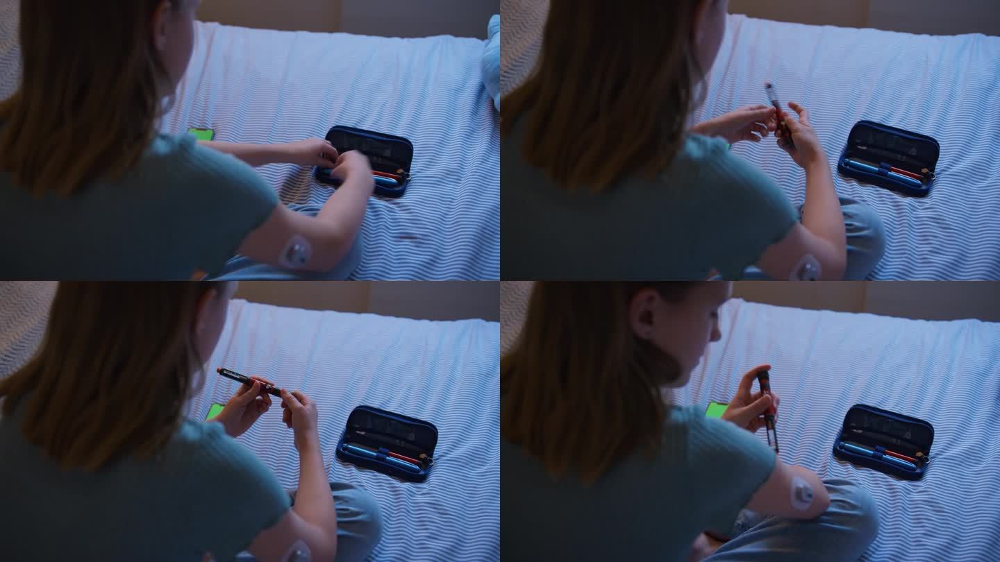 糖尿病女孩在家床上用胰岛素笔控制血糖的近距离观察