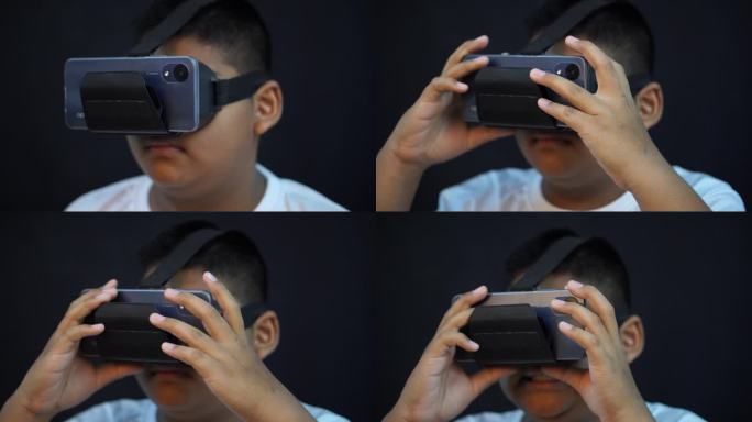 男孩使用VR虚拟现实模拟器的特写