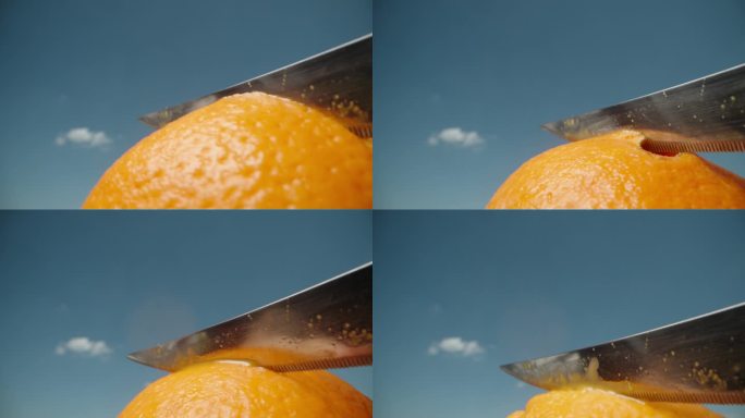 我把橘子皮切成一个圈，橙汁溅在蓝天上。