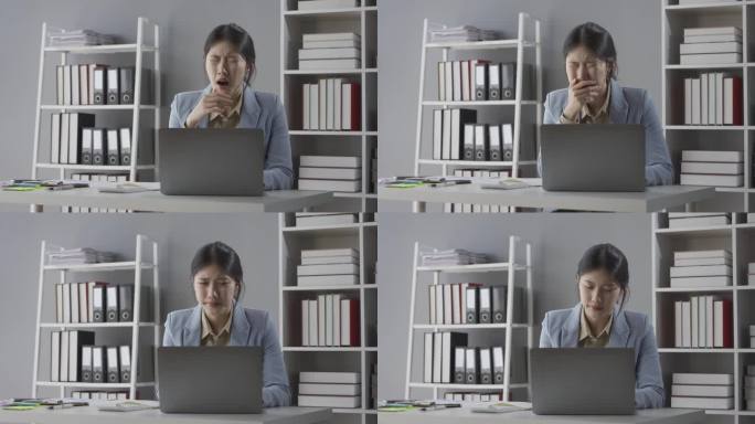 自由职业商人因为在笔记本电脑上工作后感到疲倦而伸展身体。生活方式的女人在辛苦工作后放松，在家做项目计