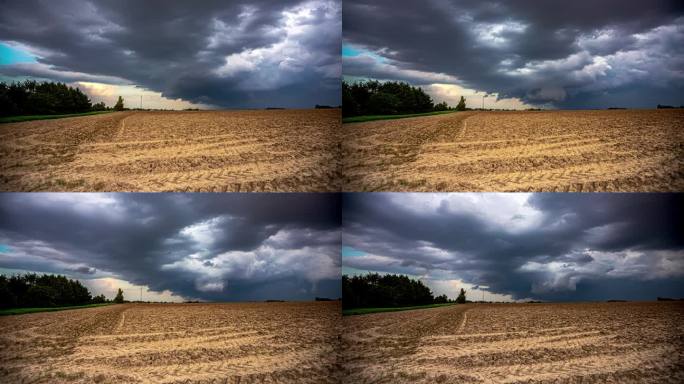黑暗的暴风雨云在田野上空汇聚。