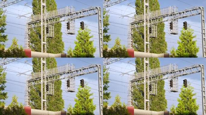 用信号装置、信号量和电力线支撑平行铁路轨道入口接触网