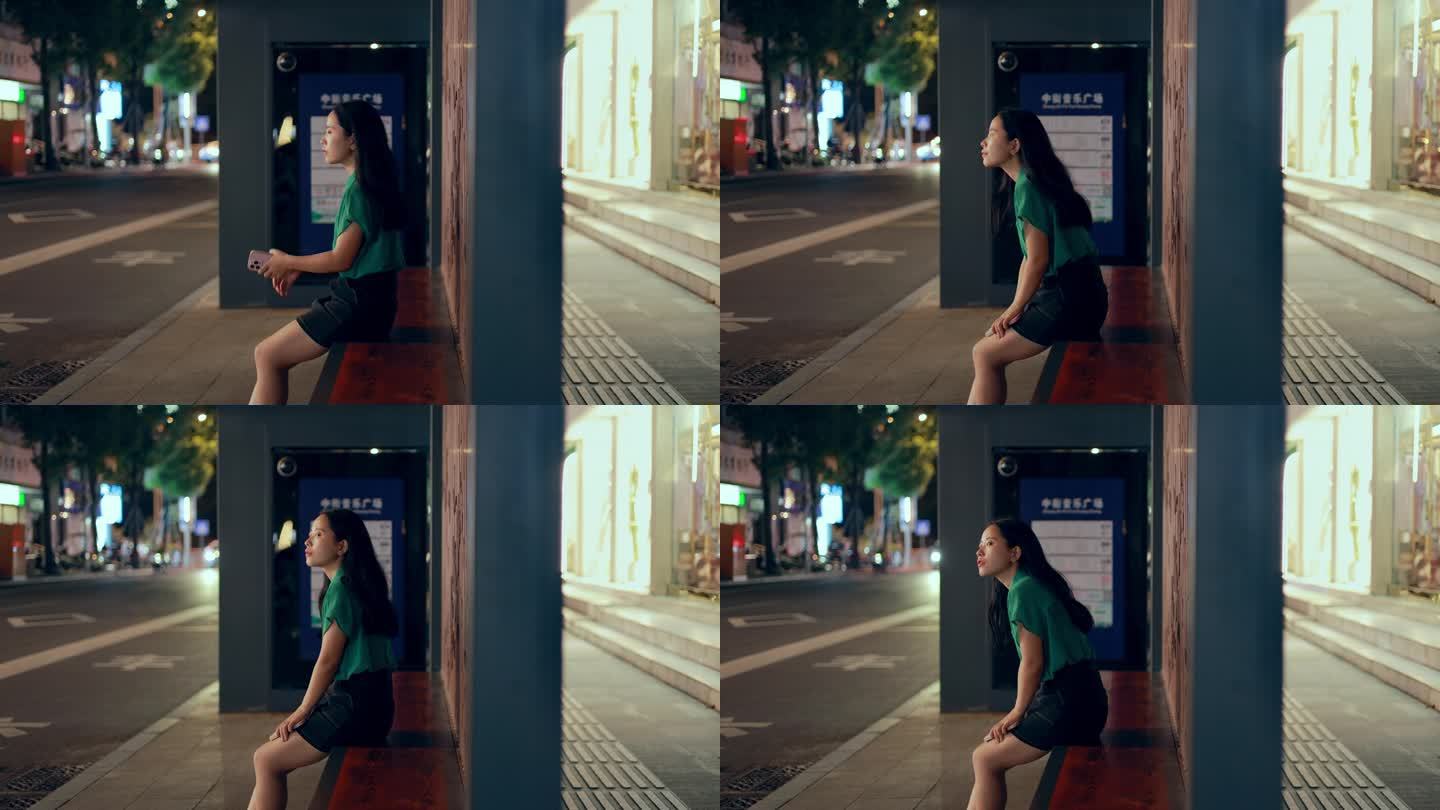 女孩公交站台等车焦急视频