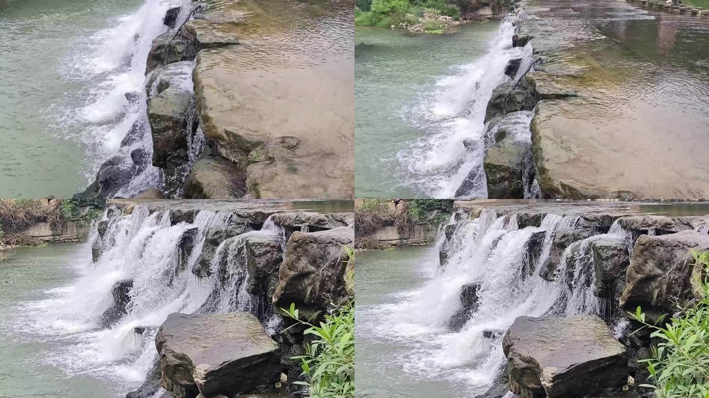 坝首河边流水水实拍水坝视频岩石瀑布