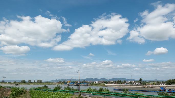 蓝天白云集镇乡村远山河道