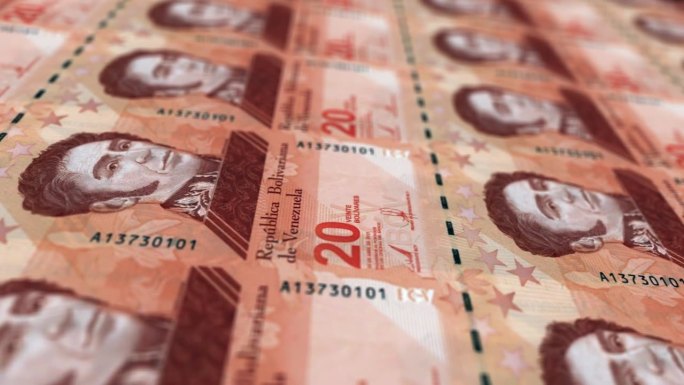 委内瑞拉，委内瑞拉玻利瓦尔印刷机打印出当前的玻利瓦尔钞票，无缝循环，委内瑞拉货币货币背景，4K，聚焦