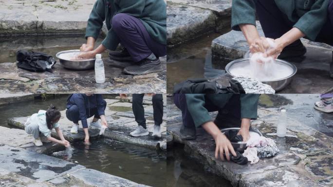 女人在水井边洗衣服