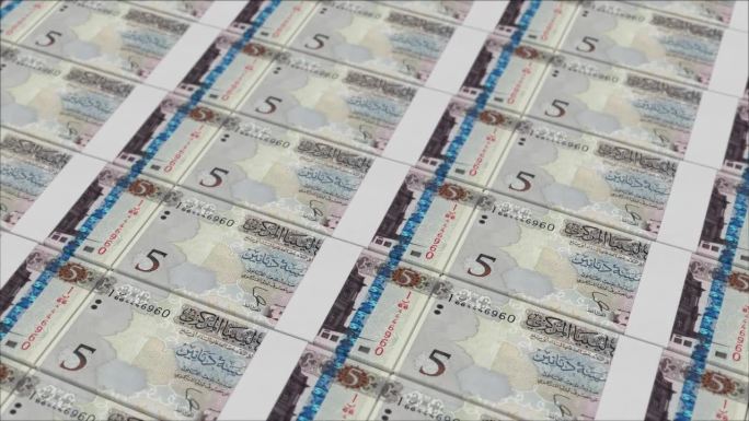 5张由货币印刷机印刷的利比亚第纳尔纸币