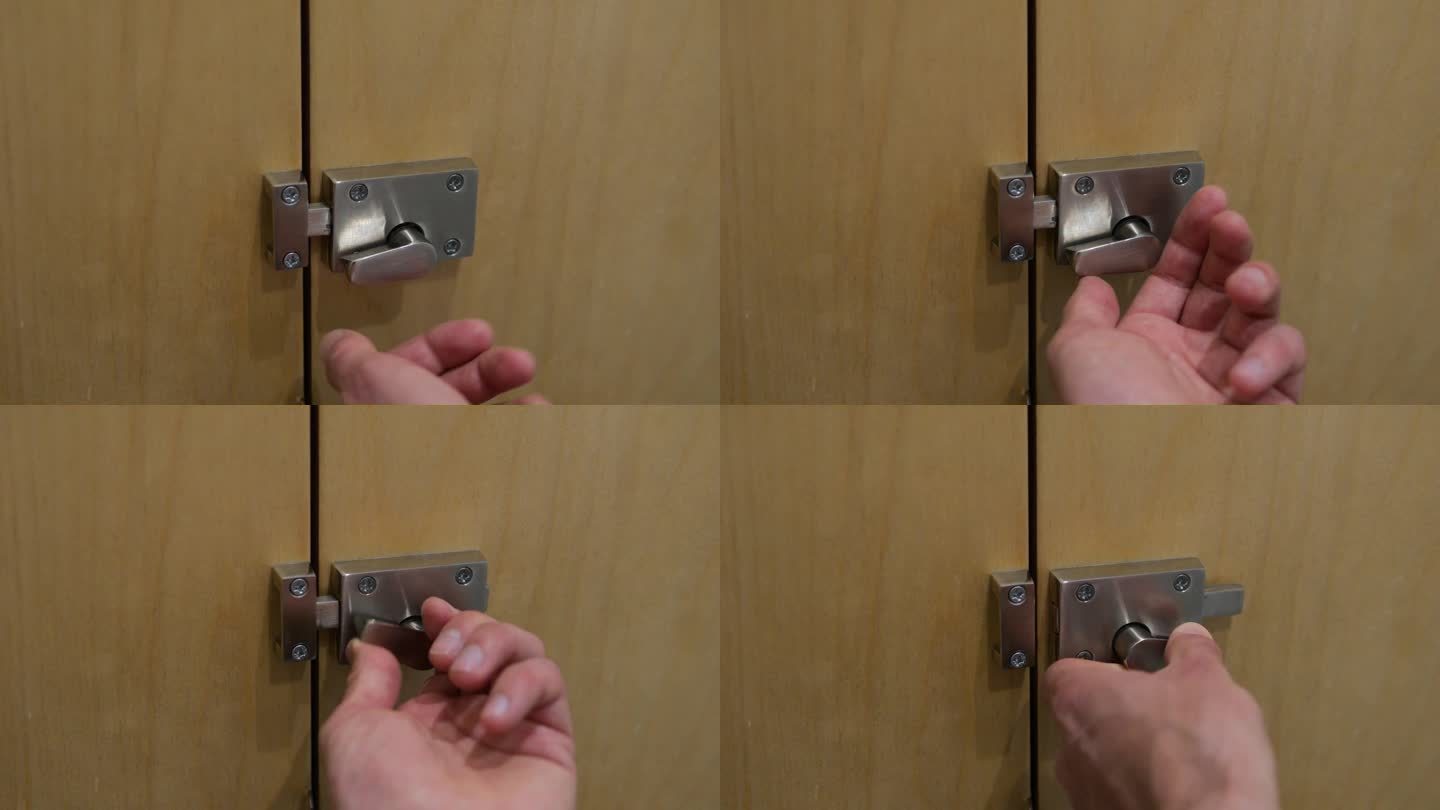 男性手动旋转旋钮的特写，用于打开不锈钢门锁插销