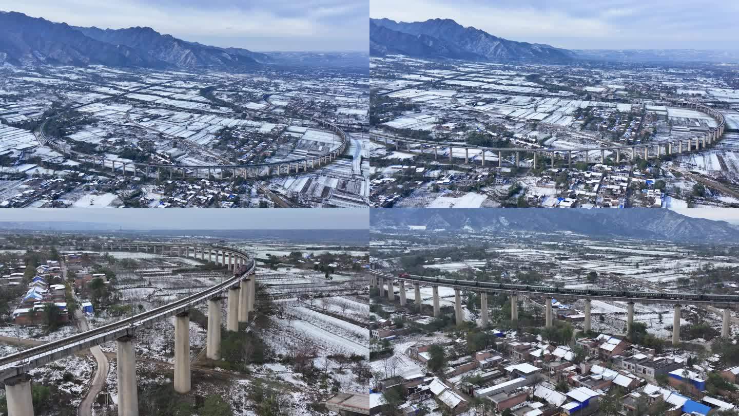 雪后中国铁路客运列车行驶在弯道上大场景