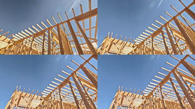 在建筑工地，有几根木棒框架梁将被用来建造一座新房子