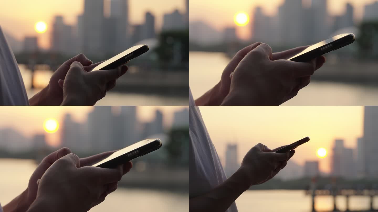 夕阳下玩手机