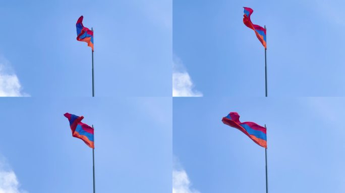 刮风的天气里，亚美尼亚国旗在晴朗的蓝天上飘扬