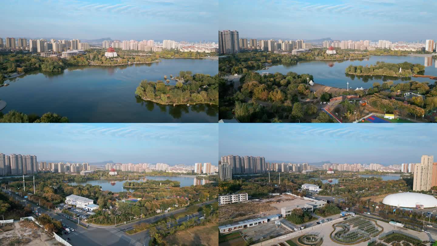 城市自然风光枣庄东湖公园晚霞航拍纪录片段