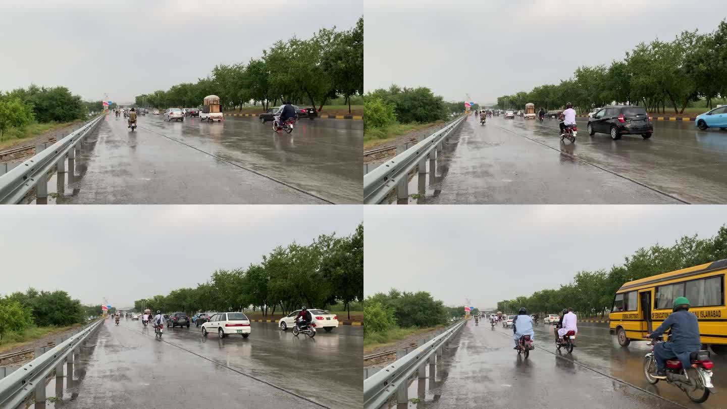 雨中车辆行驶在潮湿的道路上。雨天道路上的交通场景，阴雨天气