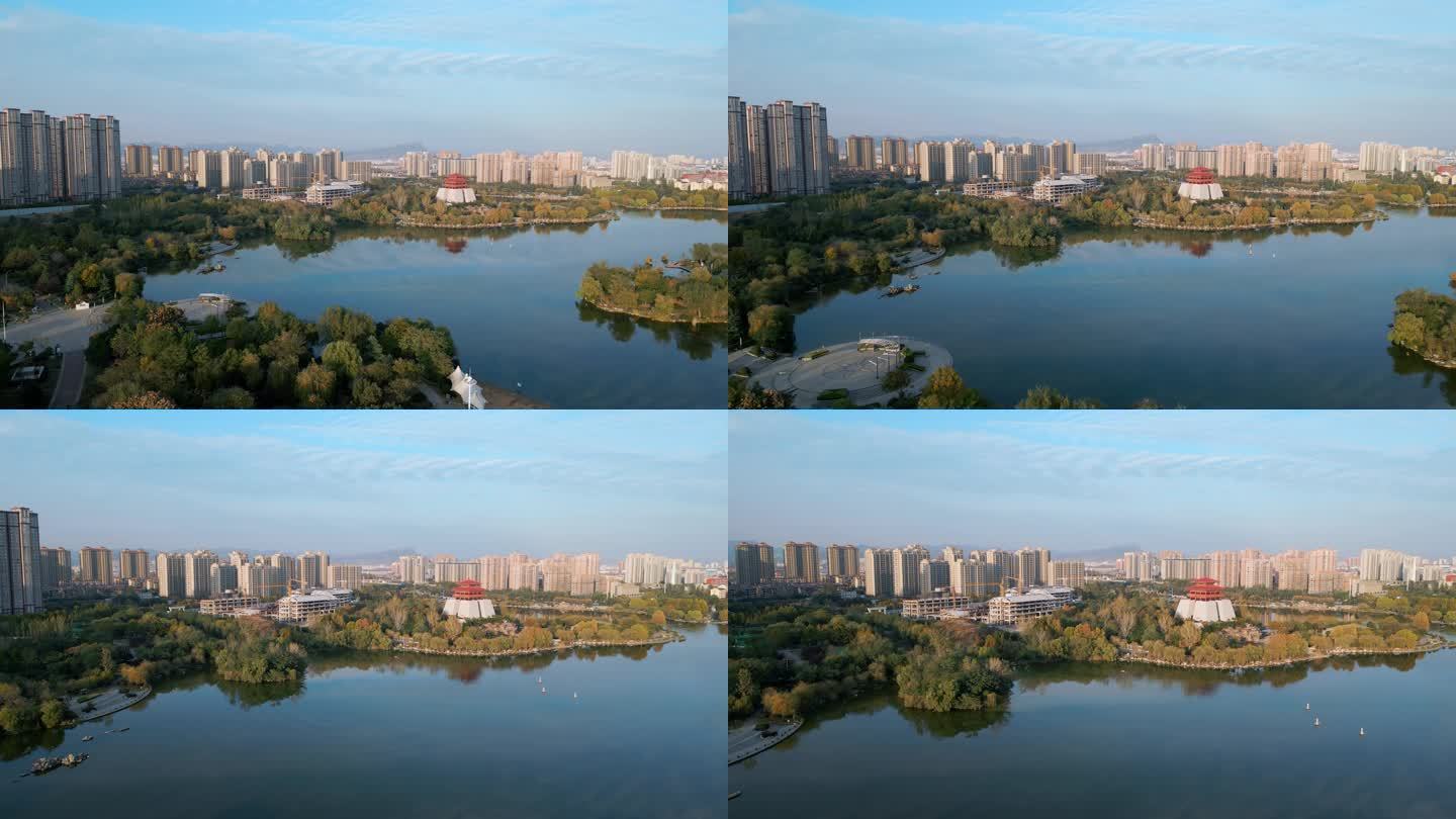 城市自然风光枣庄东湖公园晚霞航拍纪录片段