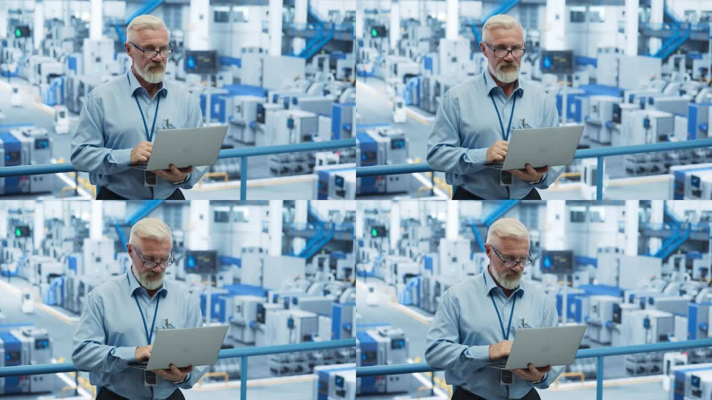一个成年工程师站在电子工厂的平台上，使用笔记本电脑。技术人员通过互联网软件进行在线技术升级