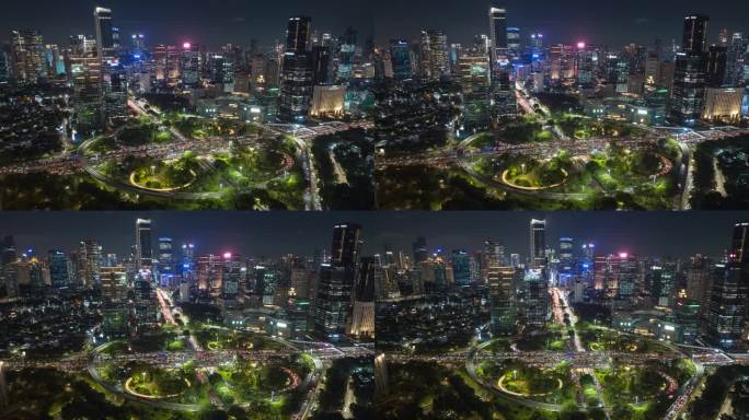 夜晚照亮雅加达市中心著名的交通街道道路立交航拍全景4k延时印尼