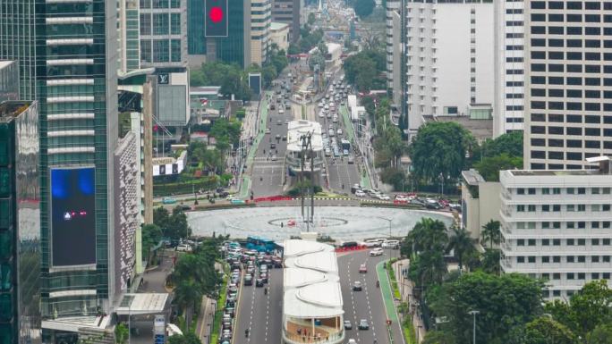 白天雅加达市中心交通街道道路圈航拍全景4k延时印尼