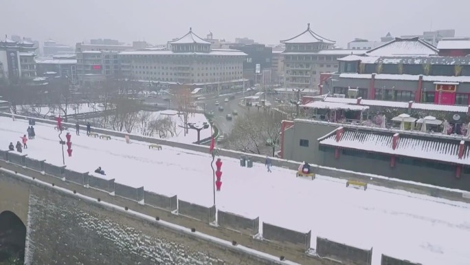 雪中的西安钟楼城墙永宁门大雁塔航拍西安