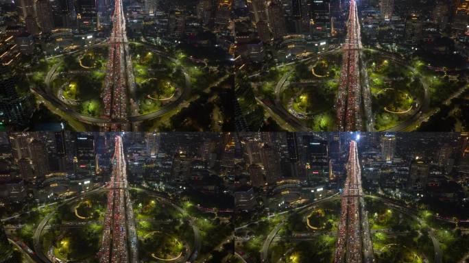 夜间照明雅加达市中心著名的交通街道道路立交航拍全景4k延时印尼