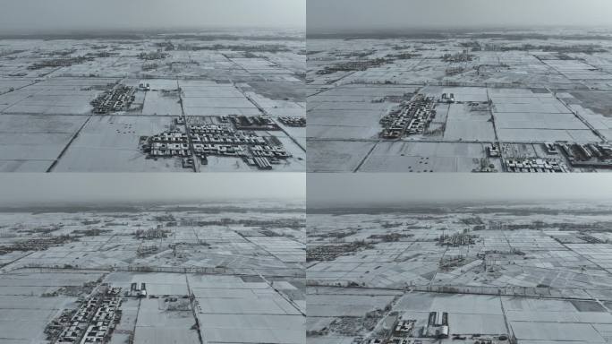 白雪覆盖中的村庄农田