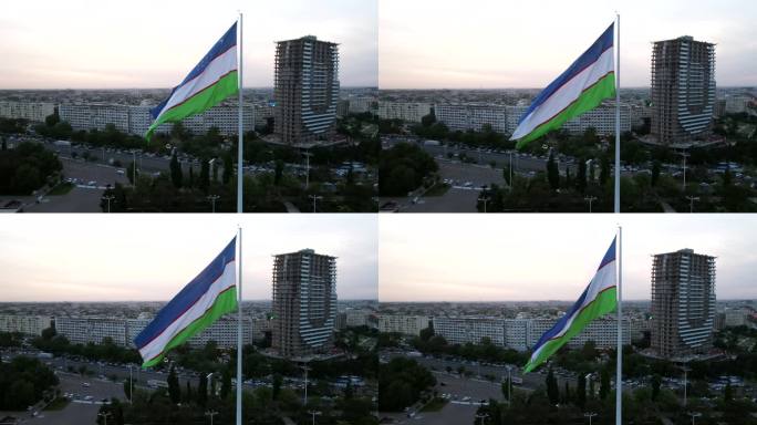 乌兹别克斯坦塔什干市Bunyodkor广场上的国旗和人民友谊宫