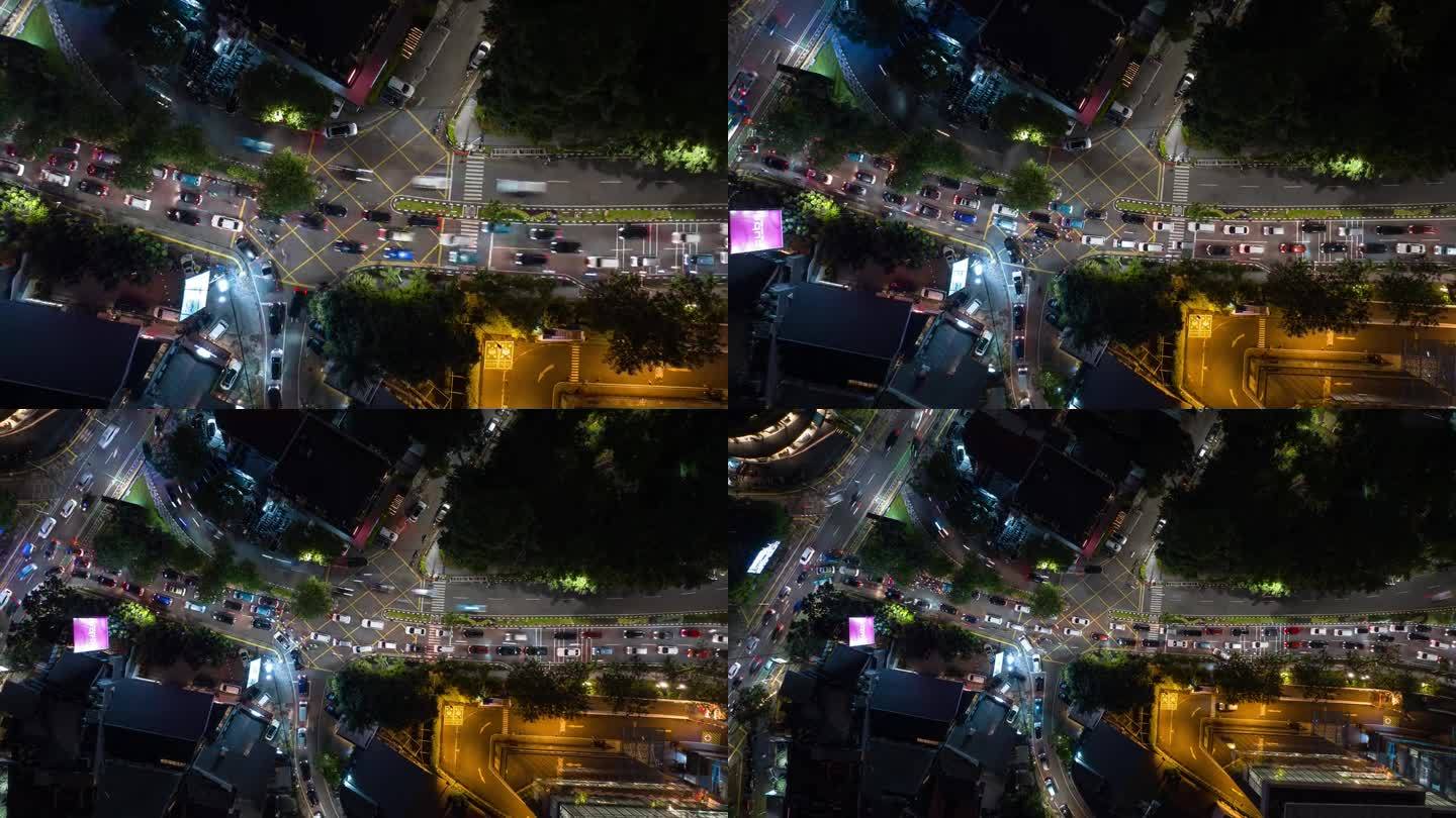 夜晚照亮雅加达市中心交通街道十字路口空中俯瞰全景4k延时印尼