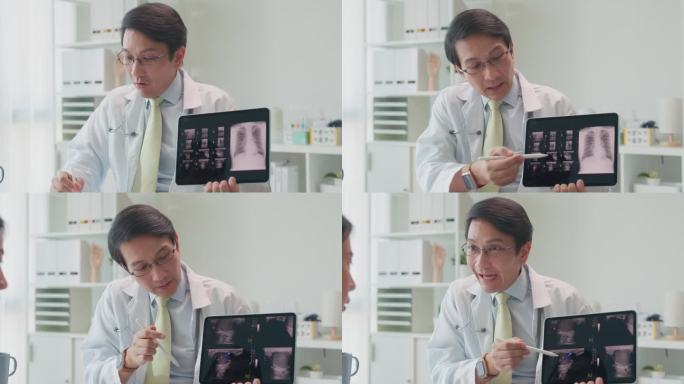成年亚洲男医生用片剂向住院的女病人展示肺部x线检查结果。医疗保健。