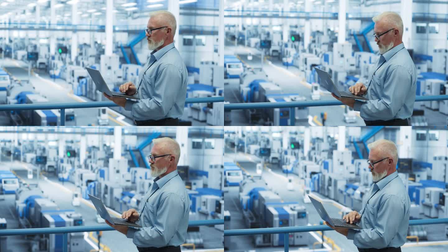 一个英俊的中年工程师的肖像，戴着眼镜，使用笔记本电脑，环顾着一个工厂设施，那里有为不同行业生产现代电