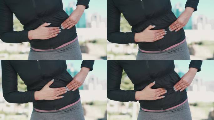 腹部抽筋和肌肉损伤的女性手部的胃、疼痛和户外健身。运动，训练和健康问题从跑步的女性按摩健康和瘀伤的问