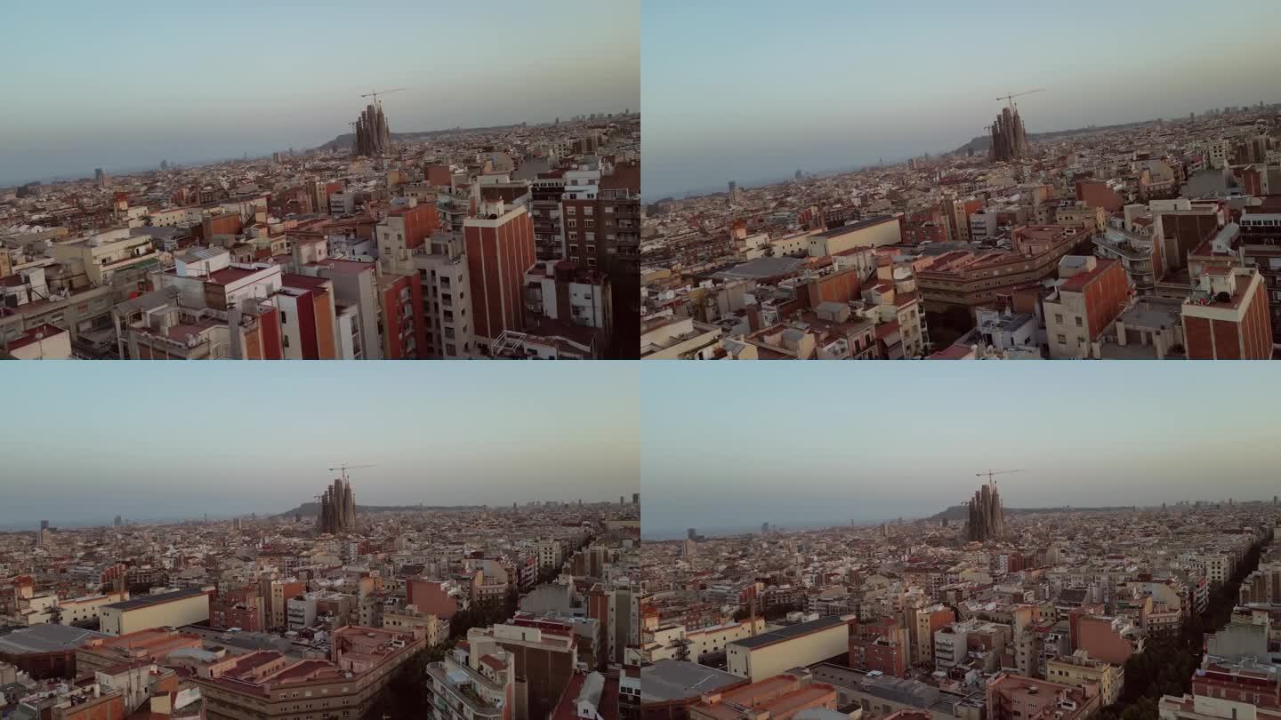空中无人机，巴塞罗那市，加泰罗尼亚住房社区和圣家堂的快速移动镜头。
