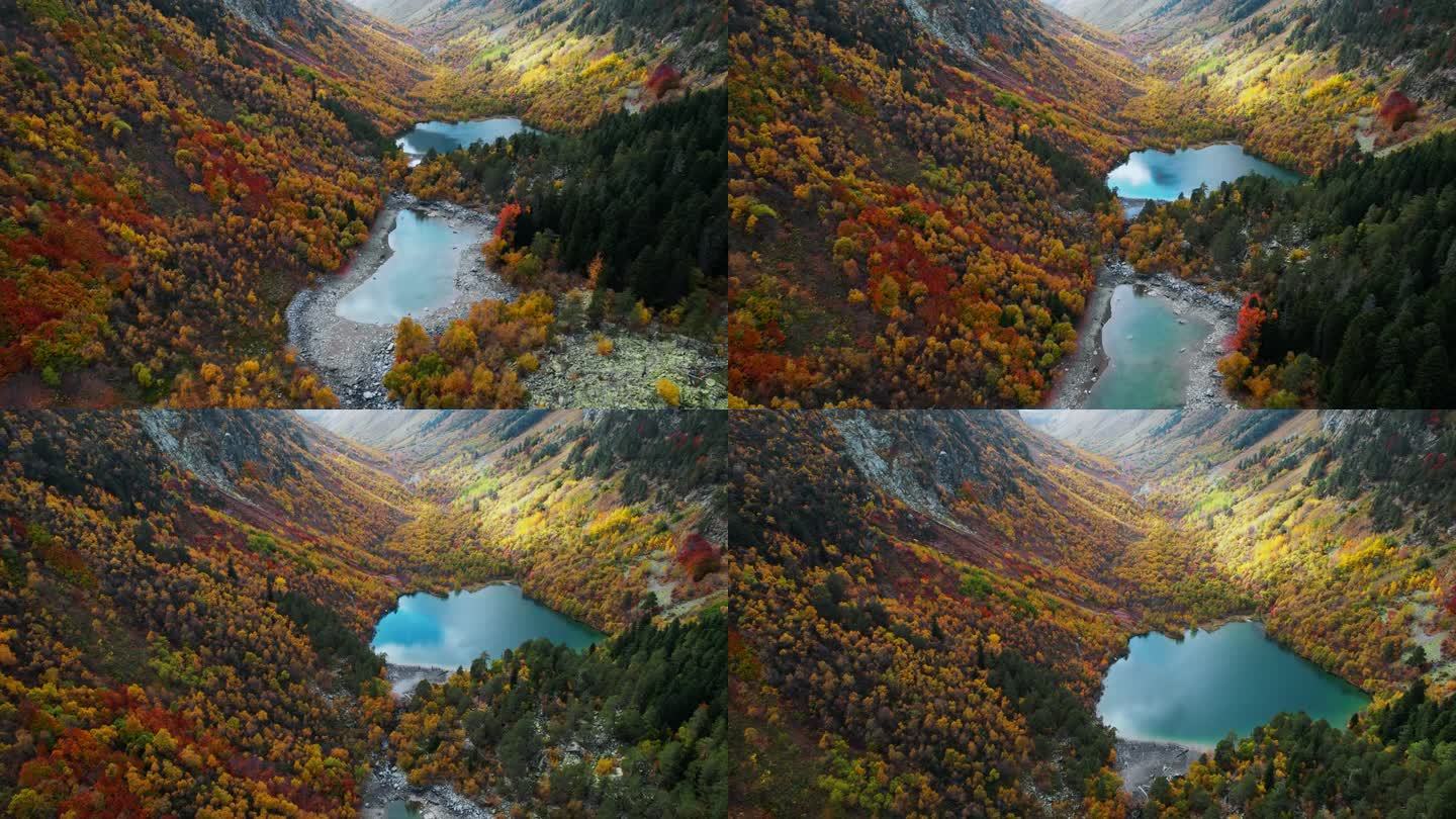 秋日山谷美丽的五彩森林和湖泊，航拍景观