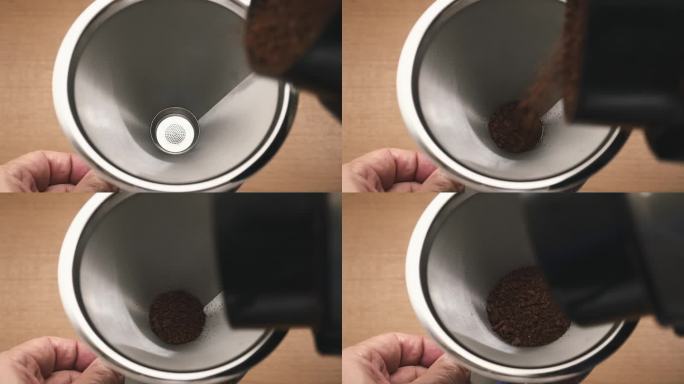 将用咖啡磨碎的咖啡渣放入不锈钢过滤器中。