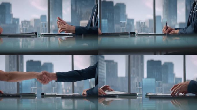 在摩天大楼办公室里，男女商业伙伴签署成功交易并握手的特写。公司首席执行官和投资助理就金融机会握手。
