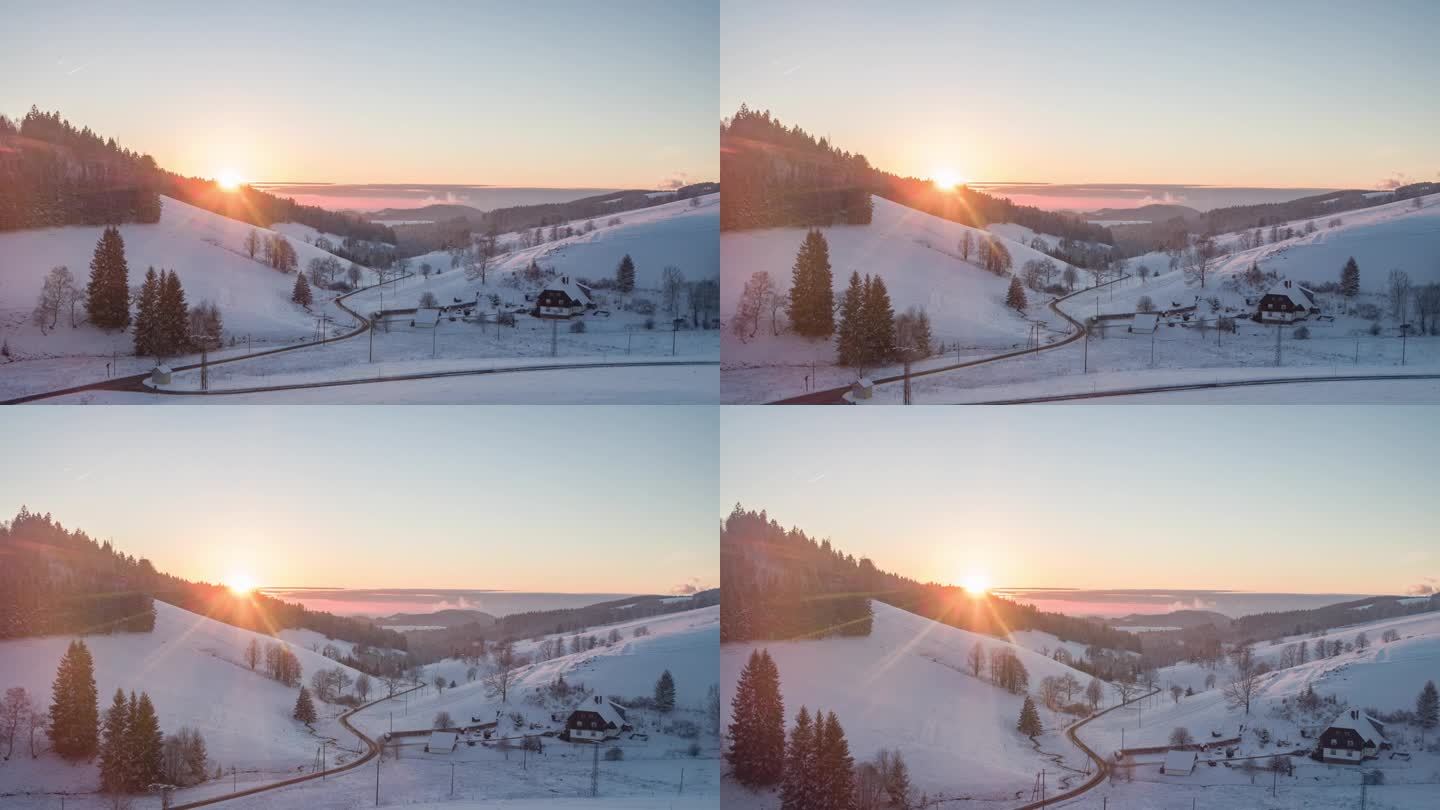 冬天，太阳落在雪山上