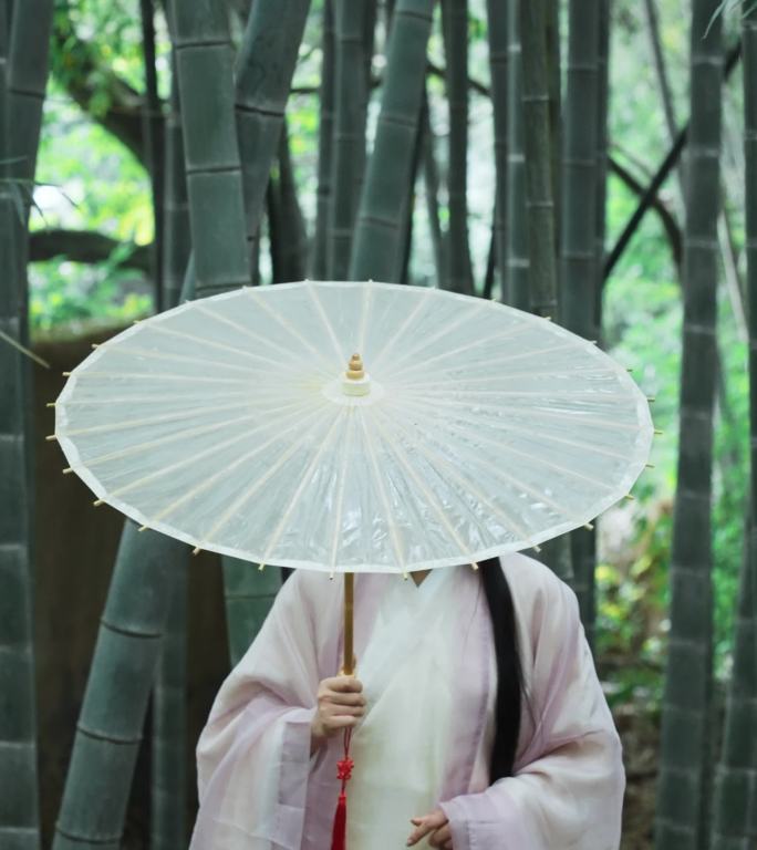 古风古装美女油纸伞在竹林里