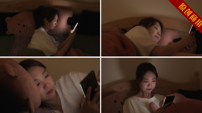 4K女孩躺在床上玩手机