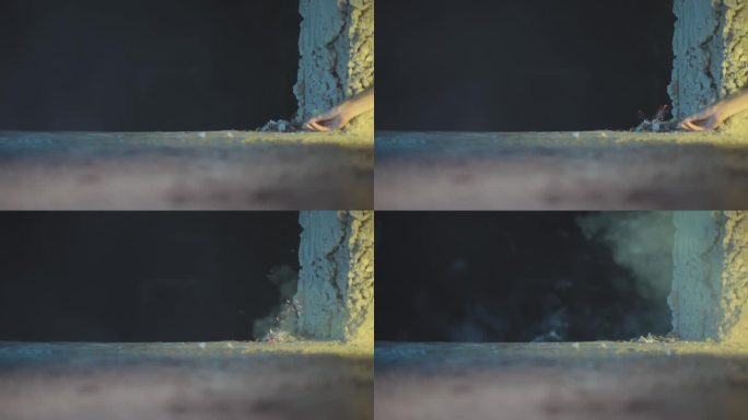 广角拍摄一只手点燃鞭炮在一个奇怪的黑烟背景，高清镜头24 fps - ProRes