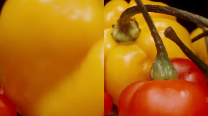 垂直视频。镜头沿着桌子向后移动，我慢慢地把黄色哈瓦那辣椒和火鸡之星品种的红色迷你辣椒放在一起。宏