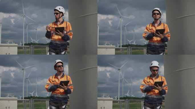 风力涡轮机工程师在风力涡轮机发电站使用平板电脑进行检查和诊断