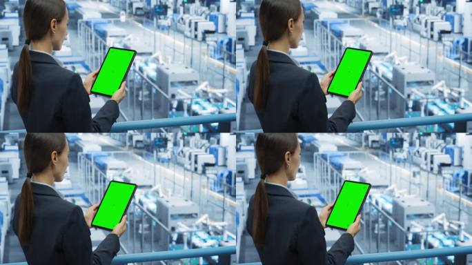电子制造项目经理在工厂用绿屏模板操作平板电脑。女性专家开发，维护，升级机器生产程序