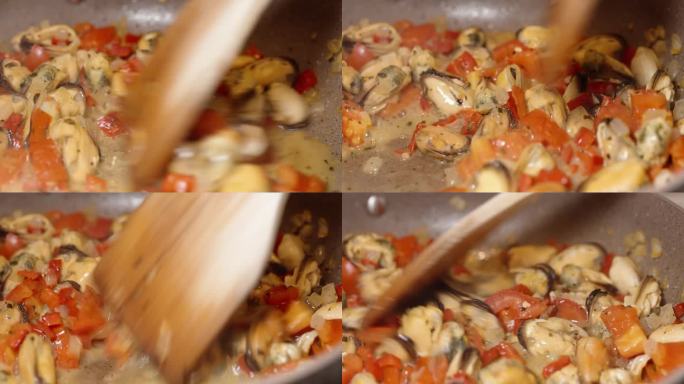 我在平底锅里搅拌青口和蔬菜，特写。