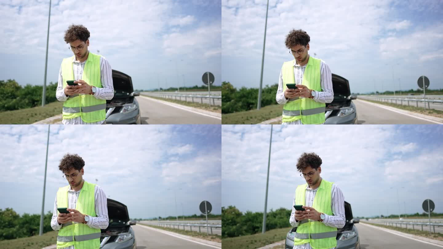 一名年轻男子在高速公路上用短信求助，他的车坏了