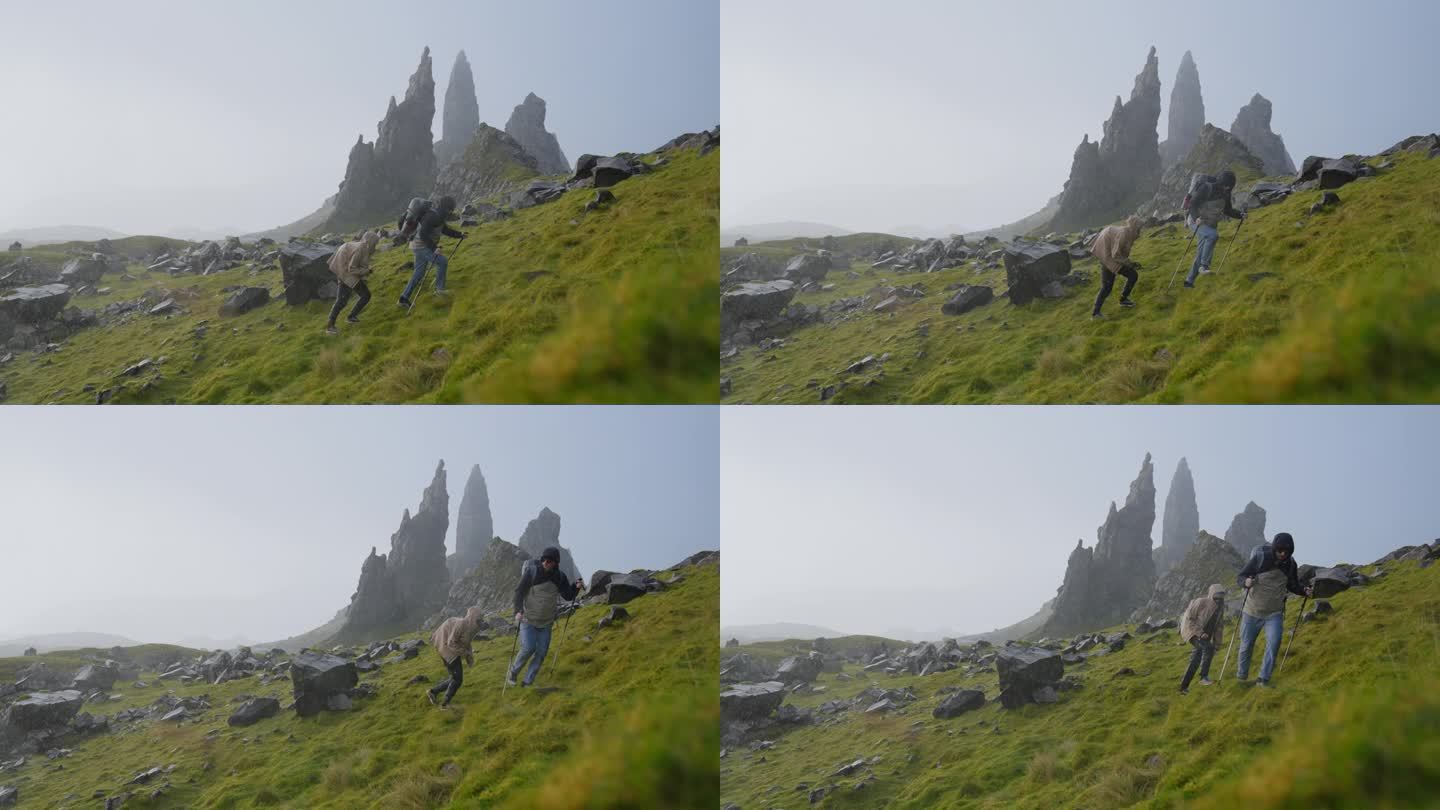 两个人一起用北欧拐杖徒步旅行。爬上一个巨大的岩石覆盖的田地