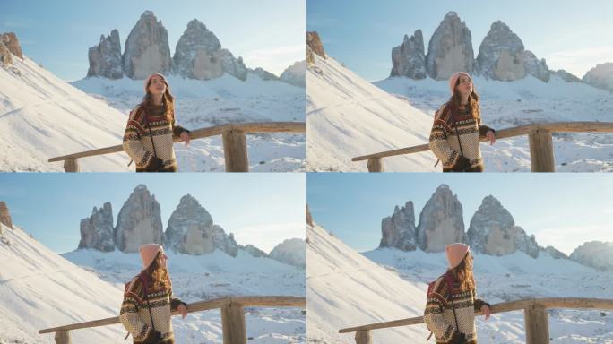 冬日里，拉瓦雷多酒店背景上拿着相机的女人