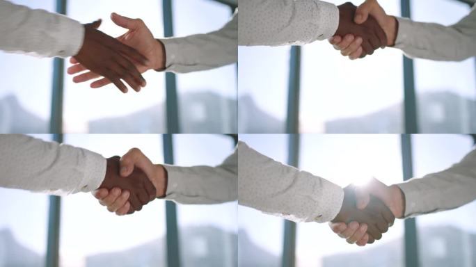 多元化的商务人士在升职、b2b合同交易或与黑人合作时握手。公司男经理团结一致，与团队合作、承诺和创新