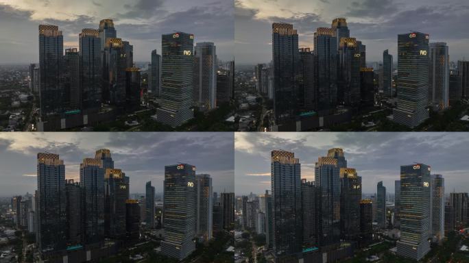 日落黄昏雅加达现代市中心航拍全景4k延时印度尼西亚