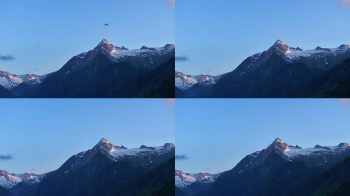 无人机在山脉上空飞行，捕捉大自然的画面
